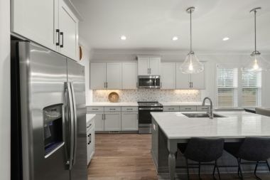 luxury kitchen remodeling project in Greater Lansing Michigan with luxury island and light fixtures