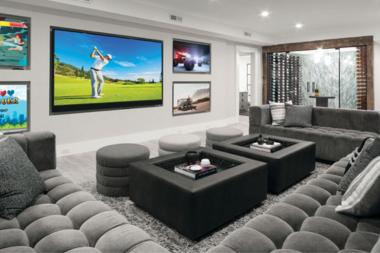 top home remodeling ideas for sports fans finished basement lounge with large sectional couch and tv custom built michigan