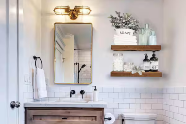 top storage ideas for your bathroom remodel floating wood shelves above toilet in half bath custom built michigan