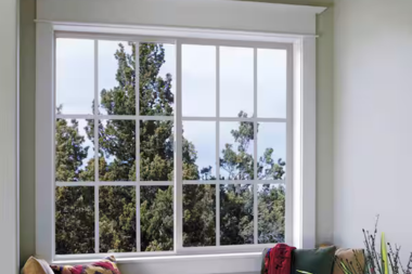 best window styles for enhancing natural light sliding windows above sitting area custom built michigan