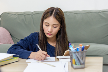 what living without a kitchen is really like during a remodeling project student completing homeowner in living room custom built michigan