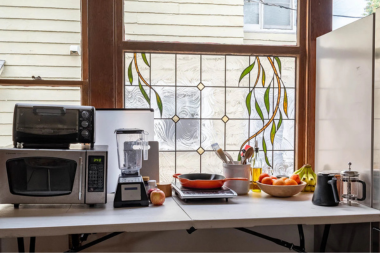 what living without a kitchen is really like during a remodeling project temporary appliance space with microwave and blender custom built michigan