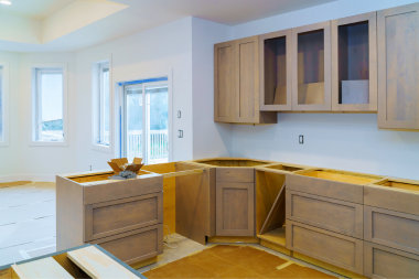 what living without a kitchen is really like during a remodeling project cabinets during installation phase custom built michigan
