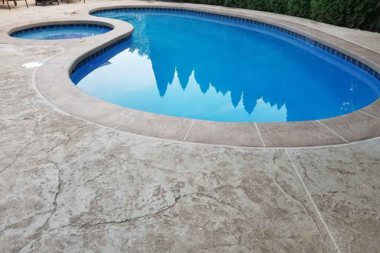 concrete pool decks an honest review lightly textured salt finish on outdoor living space surface custom built michigan