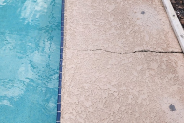 concrete pool decks an honest review cracked outdoor surface next to water custom built michigan