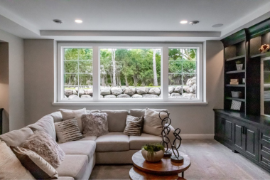 finished basement remodeling project in Greater Lansing with egress window