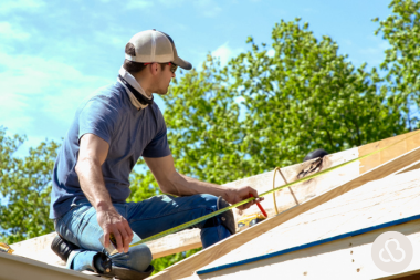 Greater Lansing Michigan home remodeler measuring roofline