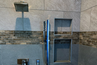 Northern Michigan bathroom remodeling project with Petoskey stone tile shower