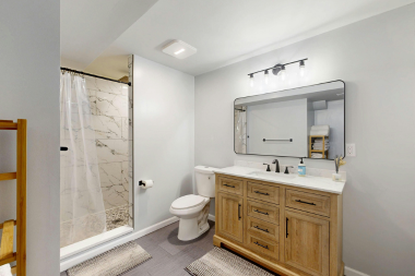 Northern Michigan bathroom remodeling project with layered lighting