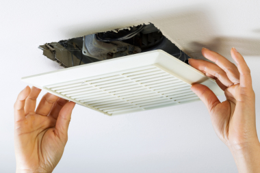Northern Michigan bathroom remodeler installing vent