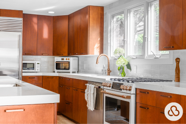 Northern Michigan luxury kitchen remodeling project with refinished cabinets