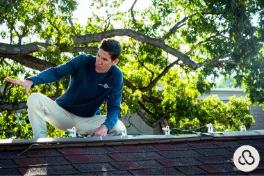 Greater Lansing roofing contractor inspecting roofline