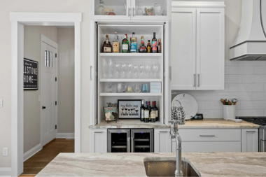 kitchen remodeling project in Greater Lansing with alcohol storage cabinet