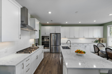 luxury kitchen remodel in Greater Lansing with tall cabinet storage