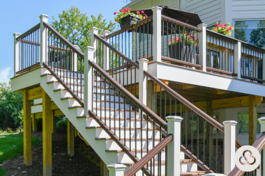 composite deck project built by Custom Built Design and Remodeling in East Lansing Michigan with Trex stairs