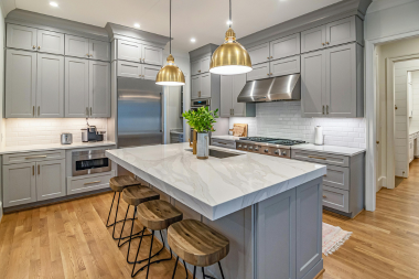 luxury kitchen remodeling project in Greater Lansing with dura supreme cabinetry and island