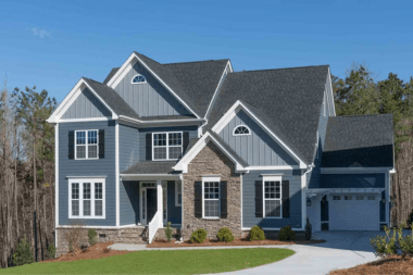 Greater Lansing home with vinyl siding and stone front