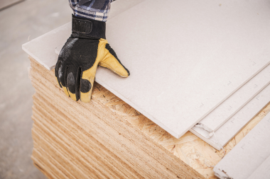 Greater Lansing home remodeling contractor selecting wood boards