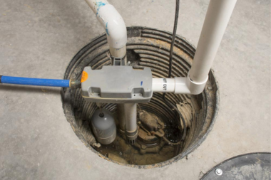 Greater Lansing basement bathroom with sump pump