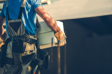 home remodeling problems families face during planning contractor carrying remodel materials custom built michigan