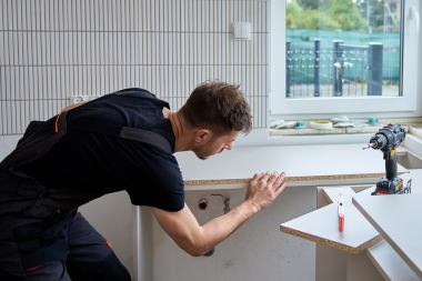 home remodeling problems families face during planning remodeler installing new kitchen countertops and cabinets custom built michigan