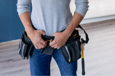 home remodeling problems families face during planning contractor with tool belt custom built michigan