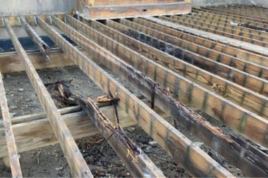 deck replacement vs repair which is right for you decking foundation with decaying and broken beams custom built michigan