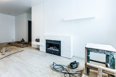 how inspection affect your home remodeling project timeline interior remodel with fireplace and shelving custom built michigan