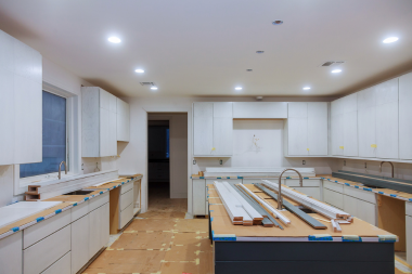 how inspection affect your home remodeling project timeline kitchen remodel with large island and white cabinets custom built michigan