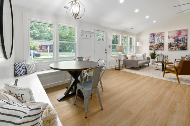 mistakes that can derail a home remodel before it starts open concept living area with breakfast nook and furniture custom built michigan