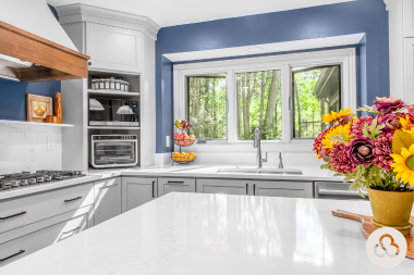 mistakes that can derail a home remodel before it starts kitchen remodeling project with quartz countertop and large windows custom built michigan