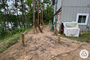 how we resolved an unforeseen change order during a deck project outdoor living space decking footings custom built michigan