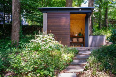 landscaping renovations to plan now for summer enjoyment modern storage shed in backyard custom built michigan