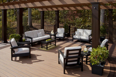 landscaping renovations to plan now for summer enjoyment pergola shade structure above composite deck living space custom built michigan