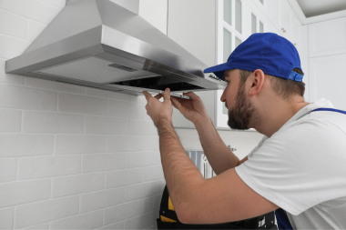 what are the benefits of kitchen remodeling contractor installing stainless steel vent hood custom built michigan