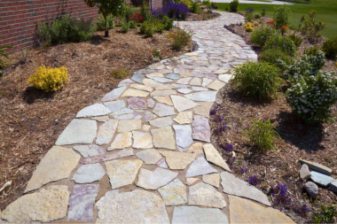 top pathway and walkway ideas for your michigan outdoor living space natural stone path in front yard custom built okemos