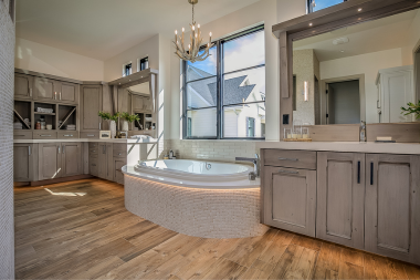 top fall bathroom remodel ideas for comfort and style spa inspired soaking tub with chandelier light fixture custom built michigan