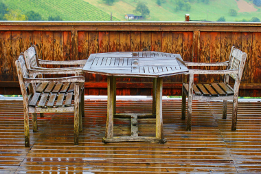 mistakes to avoid while choosing your outdoor furniture faded wood dining table and chairs custom built michigan