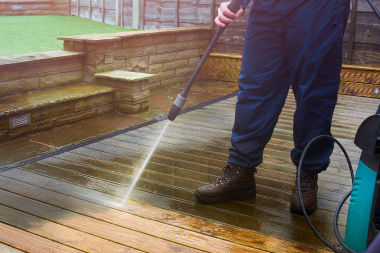 deck replacement in northern michigan what vacation homeowners should know decking contractor cleaning boards with power washer custom built boyne city