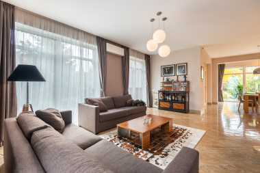 home lighting design tips to brighten shorter fall days living room with warm color temperature custom built michigan