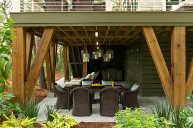 michigan under deck outdoor living space ideas dining area with chairs and pendant lights custom built okemos