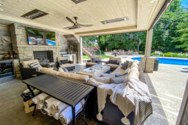 michigan under deck outdoor living space ideas fireplace area with sectional sofas and tv theater lounge custom built okemos