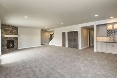 basement flooring reviews carpet luxury vinyl plank and epoxy compared carpeting in large space with fireplace custom built michigan