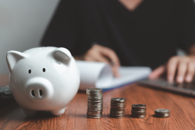 mistakes to avoid while financing your home remodel piggy bank and stacks of coins custom built michigan