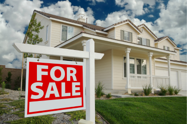 common mistakes to avoid while choosing your roof replacement material for sale sign in front of home custom built michigan