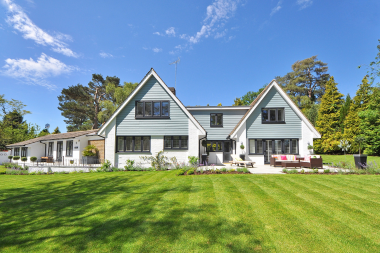 common mistakes to avoid while choosing your roof replacement material large home with spacious roof custom built michigan