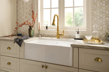 comparing kitchen sink styles for your home remodel farmhouse apron front design with gold finished faucet custom built michigan
