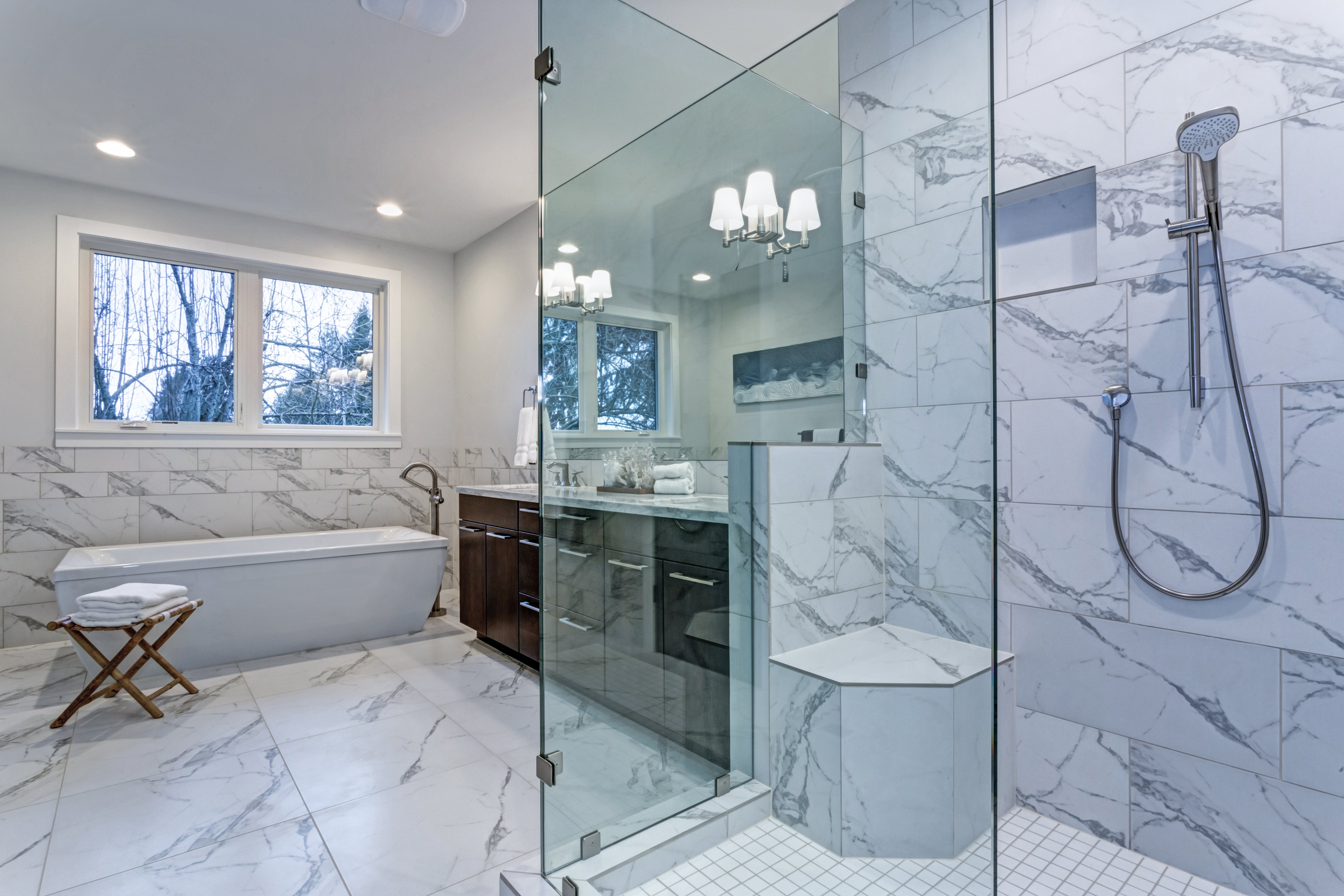 Marble shower with glass shower door