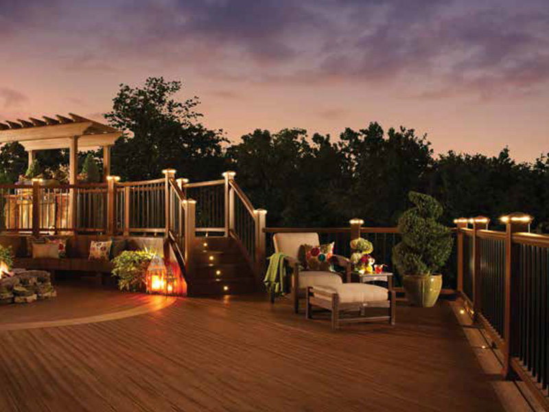 Trex composite deck at dusk with lighting features.
