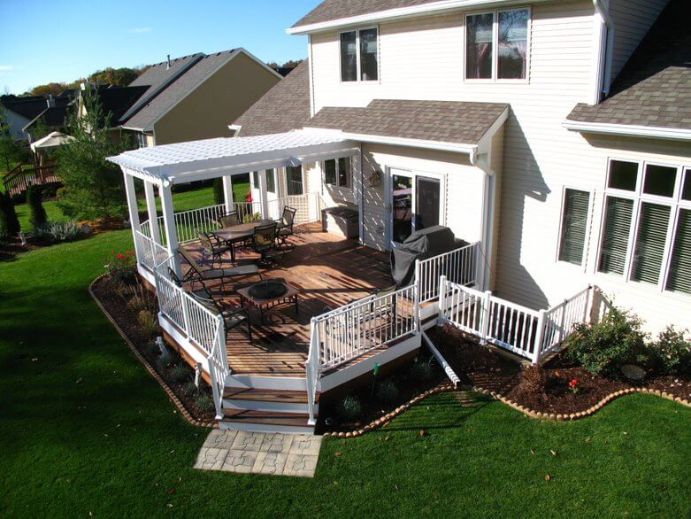 Outdoor deck with pergola and dining area